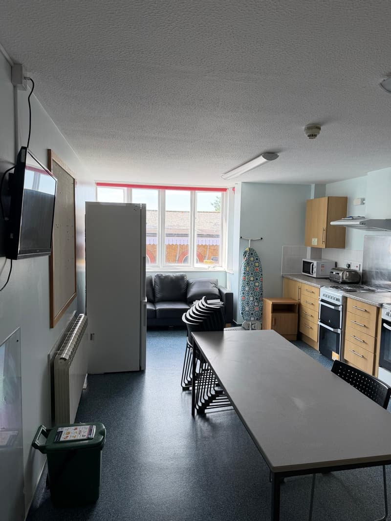 Kitchen with a long dining table