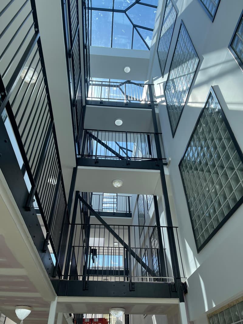 Looking up through the atrium to the glass roof