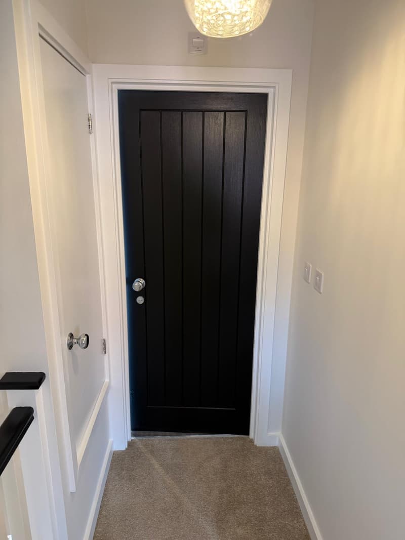 Panelled front door in black