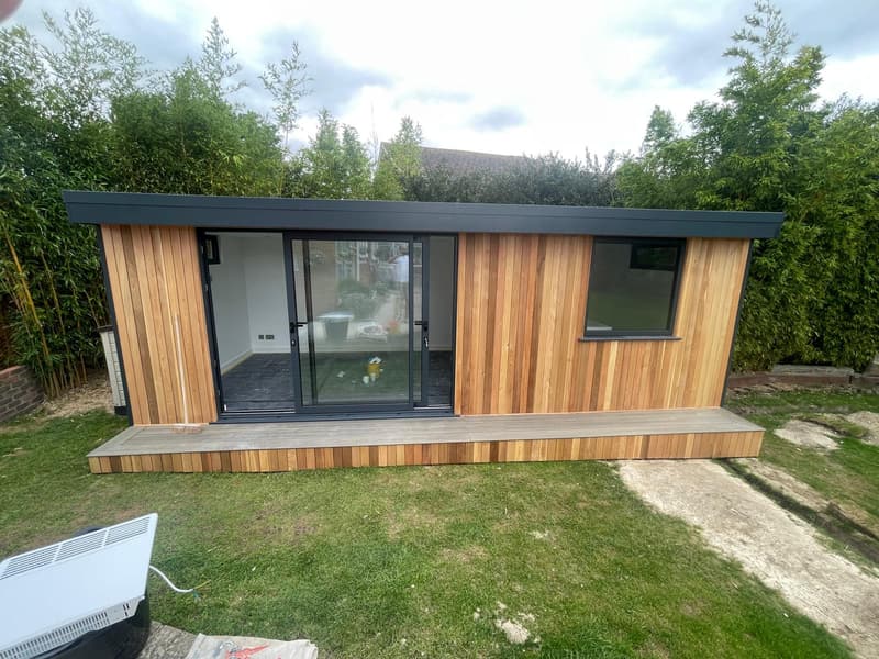 Cedar cladding and wide glazed doors
