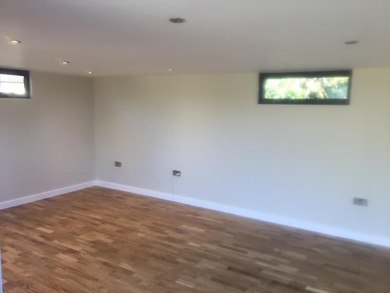 Bright white walls and an oak floor
