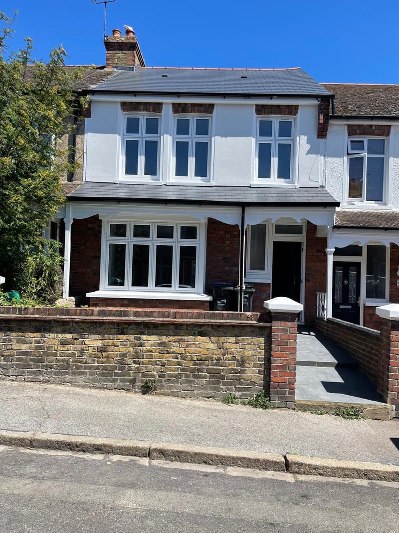 After: white front and a black front door