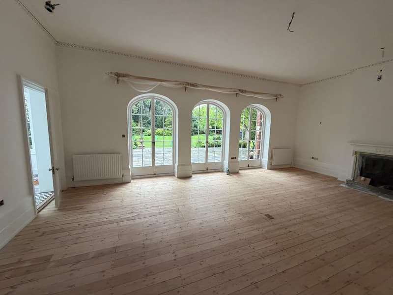 Garden room with arched French windows