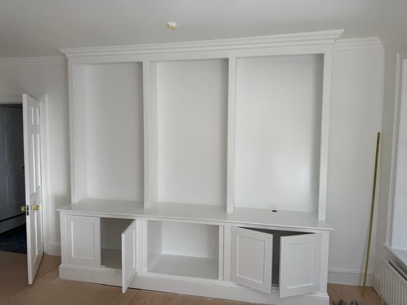 Built-in cupboards painted white