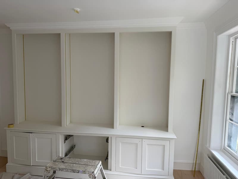 Built-in shelving and cupboards